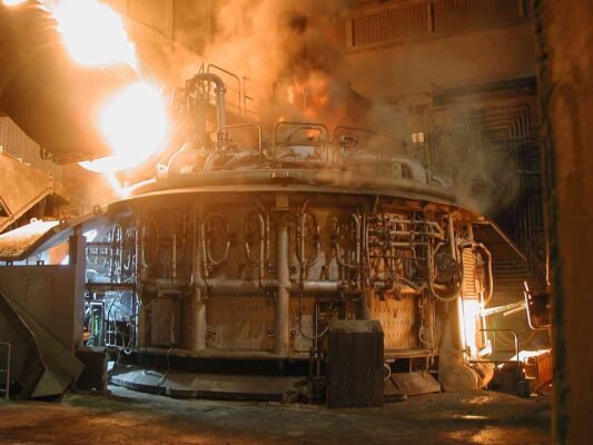 Real full-scale electric arc furnace during steelmaking at Georgsmarienhütte steel plant